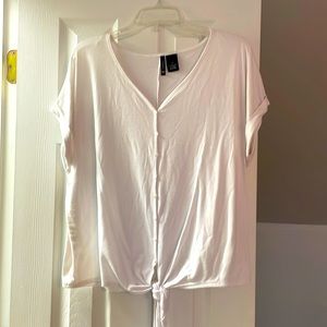 White cap sleeve top with a tie at the bottom